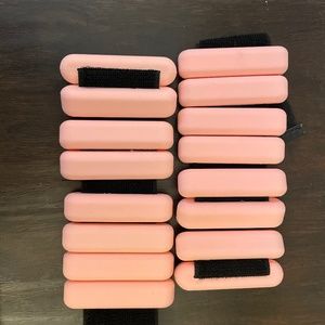 One set of pink 2lb Bala weights